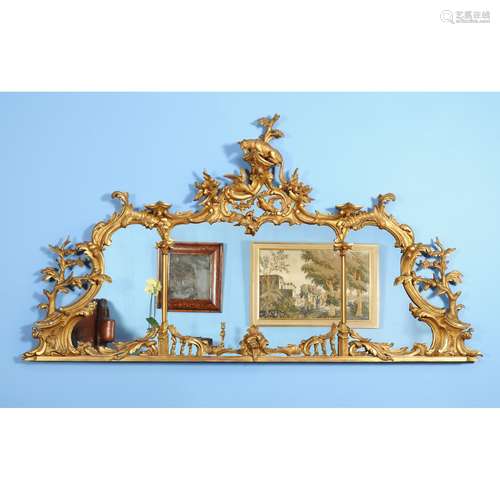 A giltwood over mantel mirror