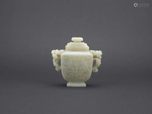 A jade carved 'lotus' and lingzhi handle vase