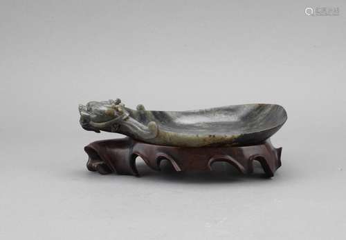 A black jade dragon-head washer with stand