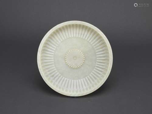 A celadon white jade chrysanthemum dish with inscription