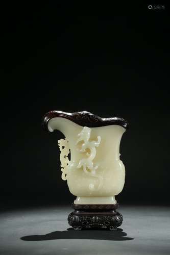 A Chinese white jade Guang vessel with cover