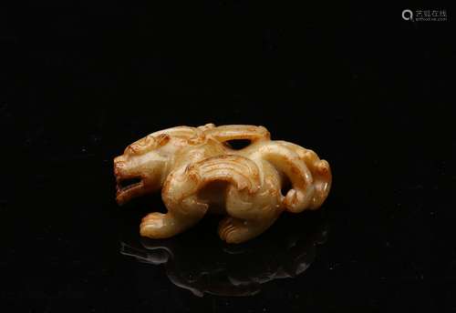 A white and russet jade carved mythical beast