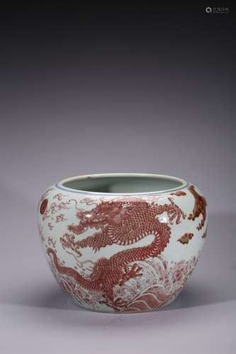 A copper red and underglaze blue 'dragon' jardiniere