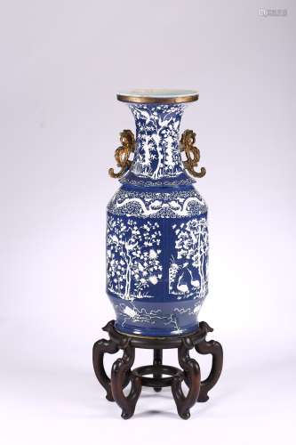 A very large blue ground white decorated vase
