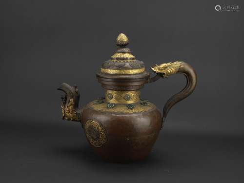 A large Tibetan bronze gilt decorated ritual water vessel