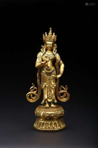 A gilt-bronze figure of standing bodhisattva