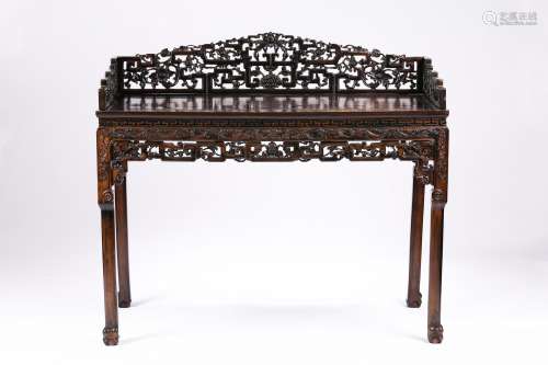 A zitan or hardwood carved dressing table