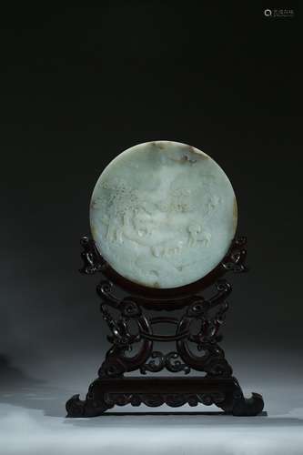 A large jade carved circular table screen