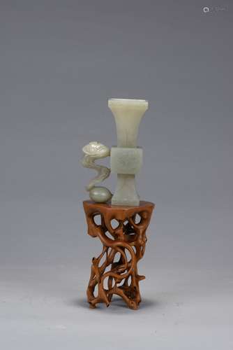 A small jade vase with huangyangmu stand