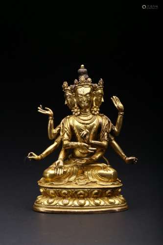 A gilt-bronze figure of Avalokiteshvara