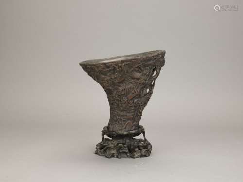 An agarwood 'landscape' libation cup with stand