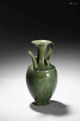 A green glazed 'dragon' pottery ewer