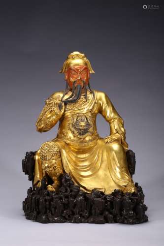 A large gilt-bronze figure of Guandi