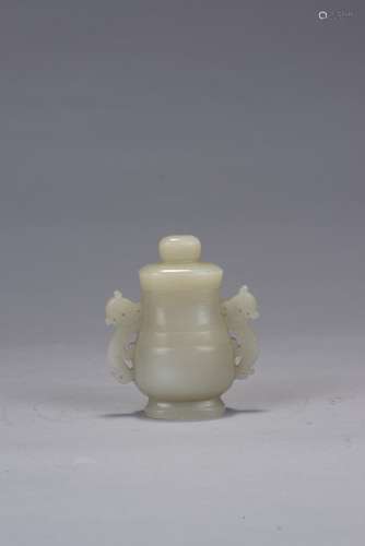 A small white jade vase