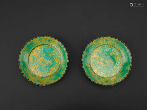 Pair of yellow ground green enamel 'dragon' chrysanthemum dishes