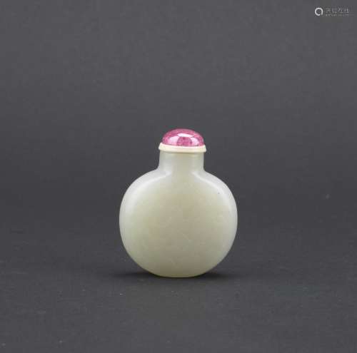 A white jade carved snuff bottle
