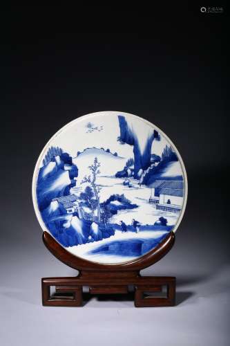A blue and white porcelain 'landscape' circular panel
