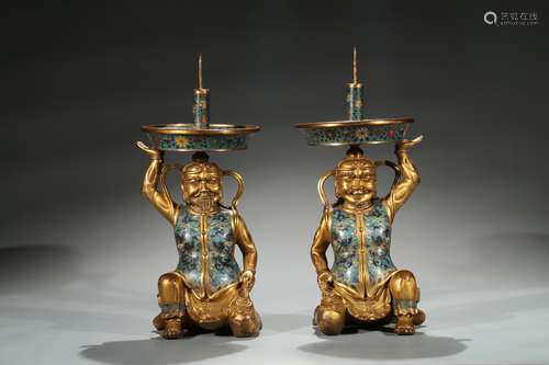 A pair of Chinese cloisonne enamel 'foreigner' candlesticks