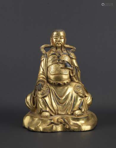 A gilt bronze figure of Taoist immortal Zhenwu