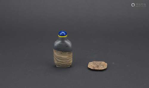 A pudding stone carved snuff bottle with dish