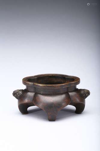 A parcel-gilt bronze quartrefoil censer