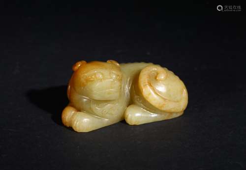 A yellow jade recumbent mythical beast