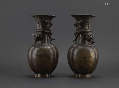 A pair of large bronze 'dragon' vases