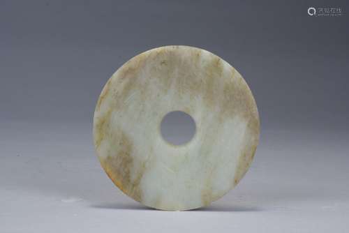 A celadon jade disc bi