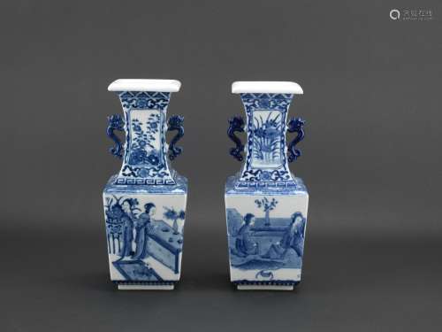A pair of blue and white 'figures' vases