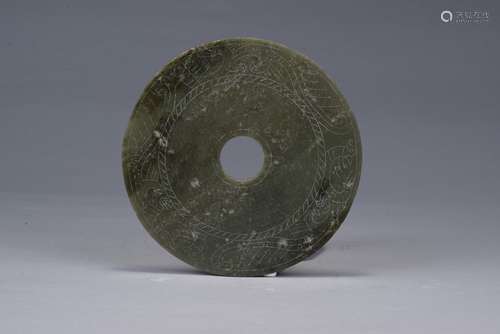 A green jade carved disc