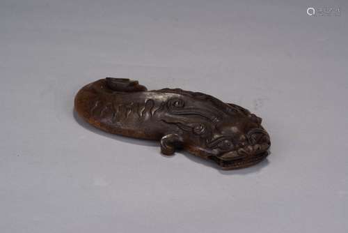 A jade carving of dragon head carp