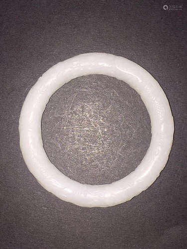 7-9TH CENTURY, A SUET WHITE JADE BRACELET, TANG DYNASTY