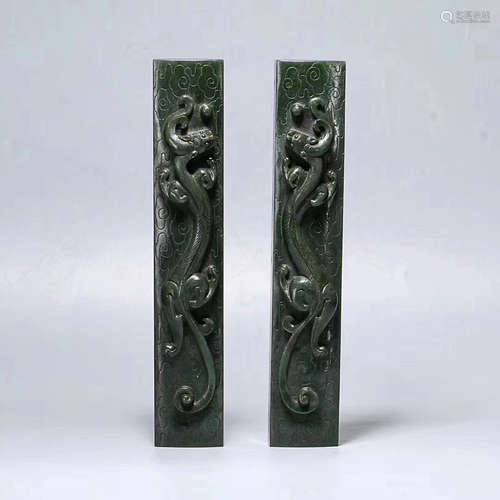 A PAIR OF HETIAN GREEN JADE PAPER WEIGHTS