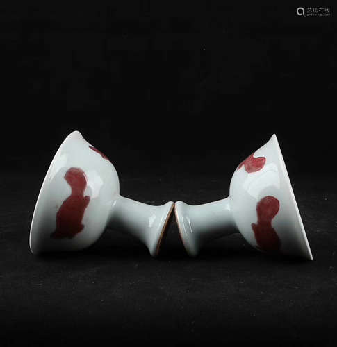 A PAIR OF UNDERGLAZE RED THREE-FISH PATTERN CUPS