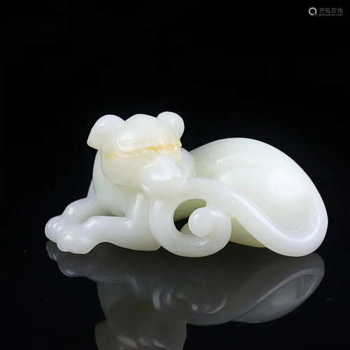 A ZHAN HAN PERIOD HETIAN JADE HAND PIECE