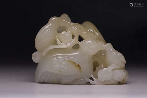 AN OLD TIBETAN HETIAN JADE FIVE SUB-KA DESIGN HAND PIECE