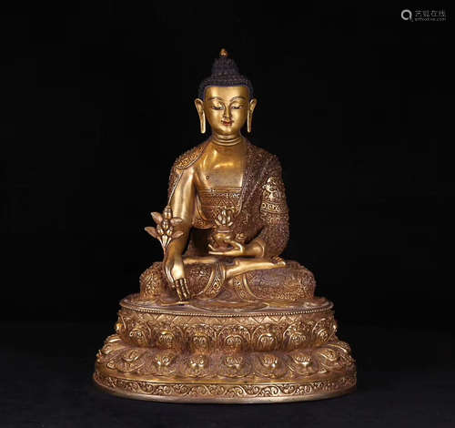 A TIBETAN GILT BRONZE BUDDHA STATUE