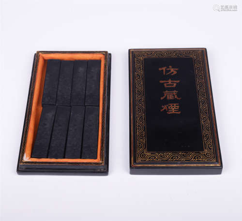 EIGHT CHINESE INK CAKES IN WOOD CASE