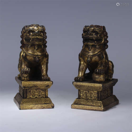 PAIR OF CHINESE GILT BRONZE LIONS