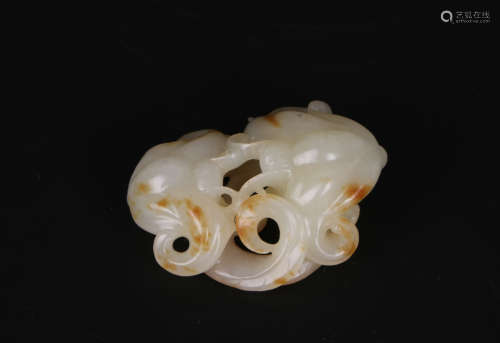 A chinese white jade carved pendant