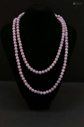 A violet color emerald necklace