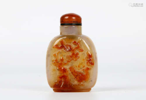 A chinese white jade carved snuff bottle