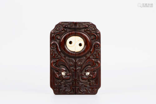 A chinese hardwood carved decoration