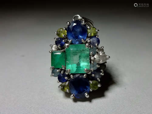 A 19c emerald green color sapphire pendant