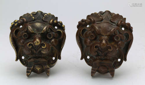 A pair of copper adornment