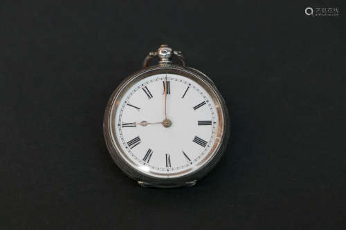 A silver pocket watch