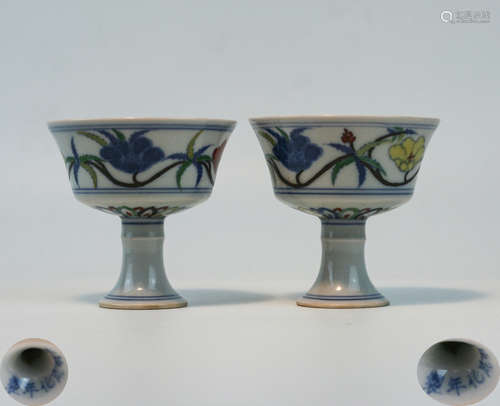 PAIR OF LOTUS PATTERN STEMCUPS