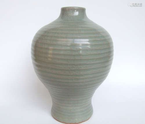 A GREEN GLAZED LONGQUAN MEI VASE