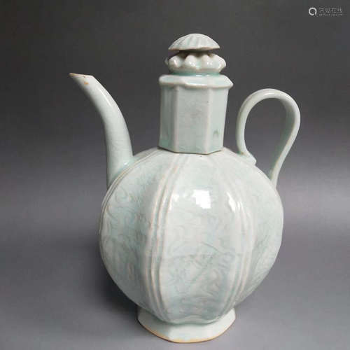 A MELON SHAPED CELADON EWER