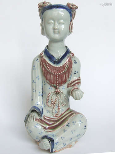 A BLUE AND RED GLAZED GIRL FIGURE